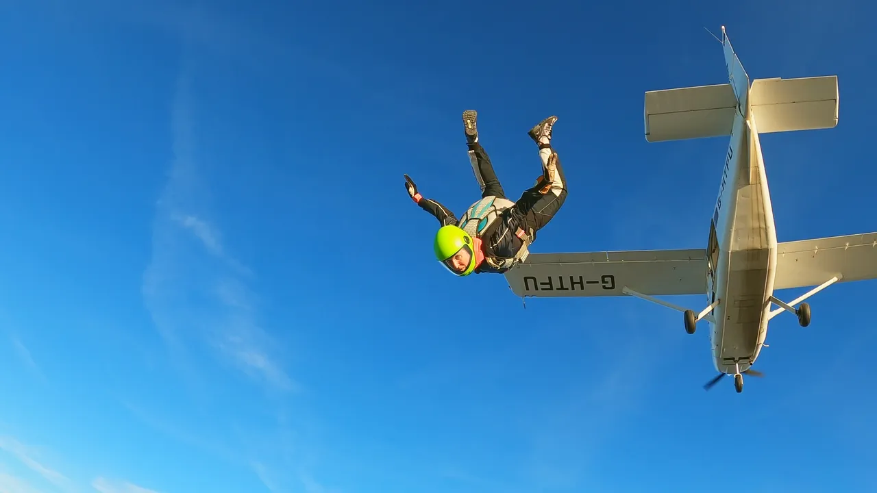 A skydiver jumps out of a plane over the Yorkshire Coast for Project Yorkshire ©SkydiveGB